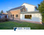 Einfamilienhaus mit Südgarten + Garage!
