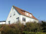 Haus mit Nebengebäuden